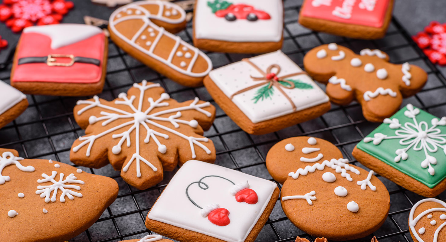 God jul önskar vi med pepparkakor i olika former och smaker.