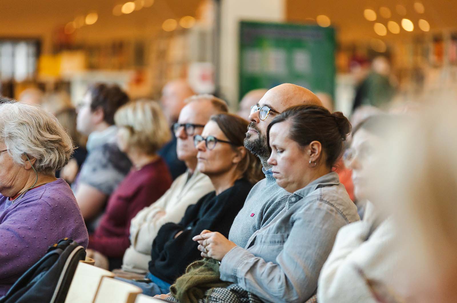 Människor i publik på Malmö möts november 2025.