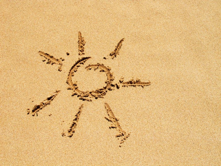 Sol som ritats i sanden
