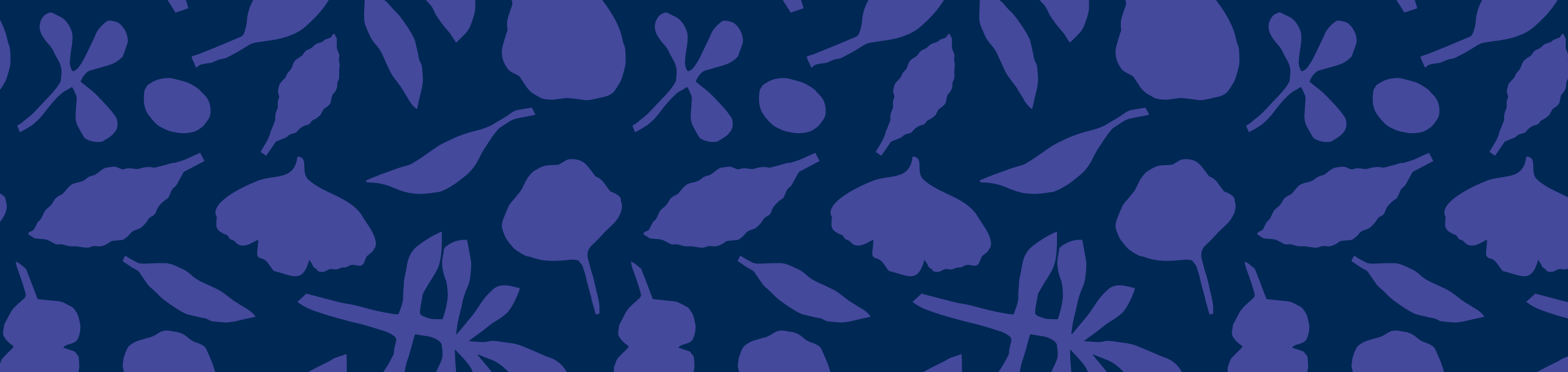 Bild på grafiskt mönster med blad på lila bakgrund.