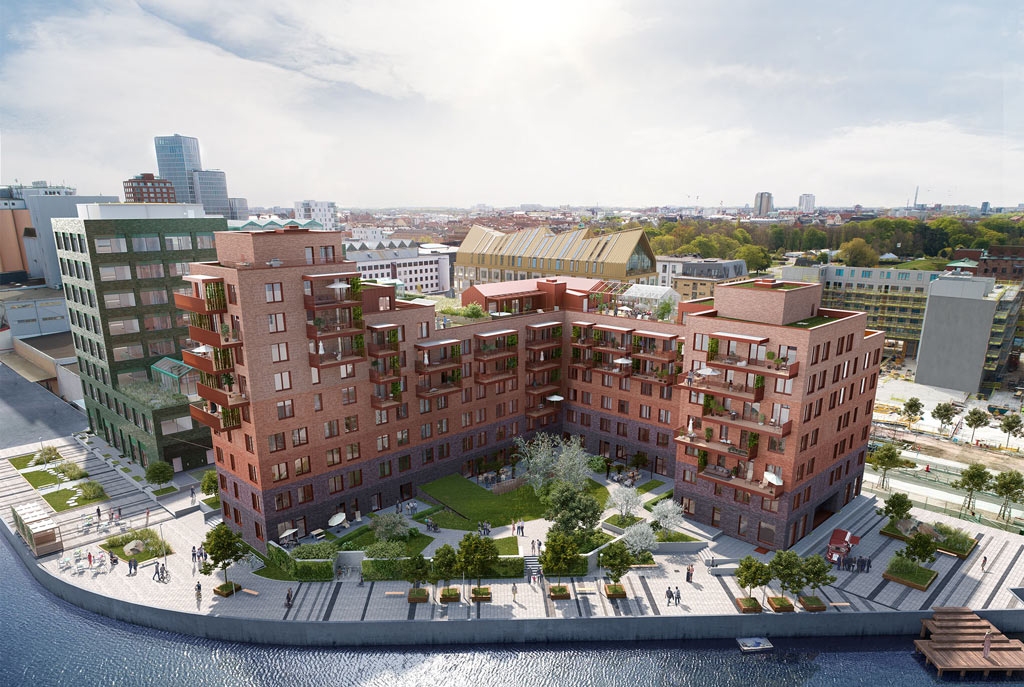 Från de stora balkongerna i det nybyggda huset ser man ut över alla som
passerar på sina promenader längs med kanalen.